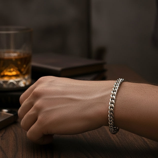 Tyrone 8mm polished silver stainless steel Cuban link bracelet with a secure clasp. Bold, modern statement jewelry.