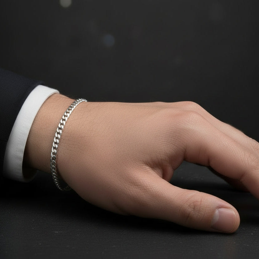 Tyrona 5mm gold Cuban link bracelet crafted from stainless steel with a polished finish. Features a classic curb chain design with a secure clasp.