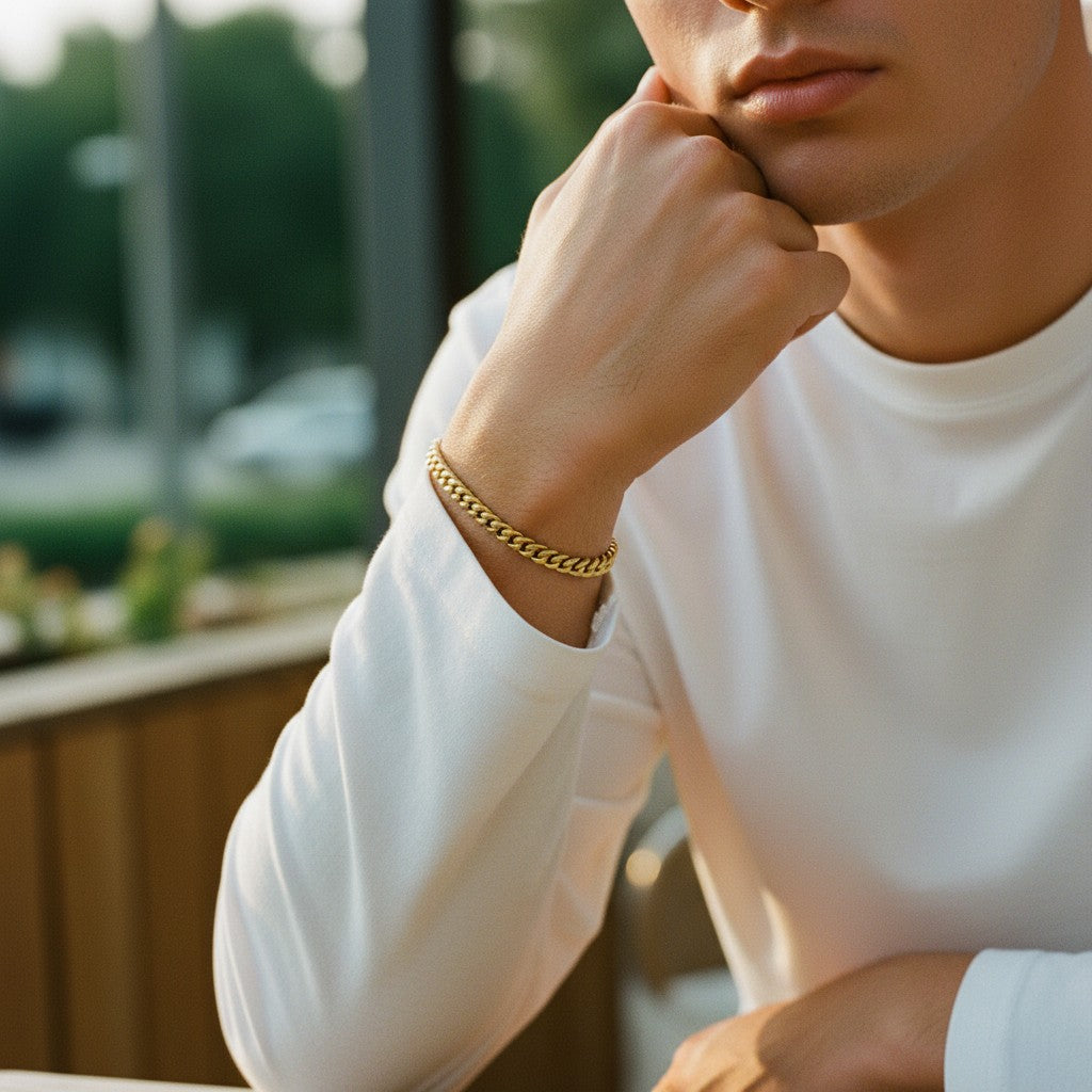 Tyrona 5mm gold Cuban link bracelet crafted from stainless steel with a polished finish. Features a classic curb chain design with a secure clasp.