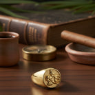 Tyrone Guardian Cherub Ring, gold stainless steel signet ring with detailed angel motif, perfect for everyday wear.