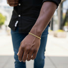Tyrona 5mm gold Cuban link bracelet crafted from stainless steel with a polished finish and lobster clasp.