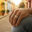 Tyrona women's Nova band ring in polished silver-tone stainless steel with precision-set zircon stones. Approx. 4mm band width.